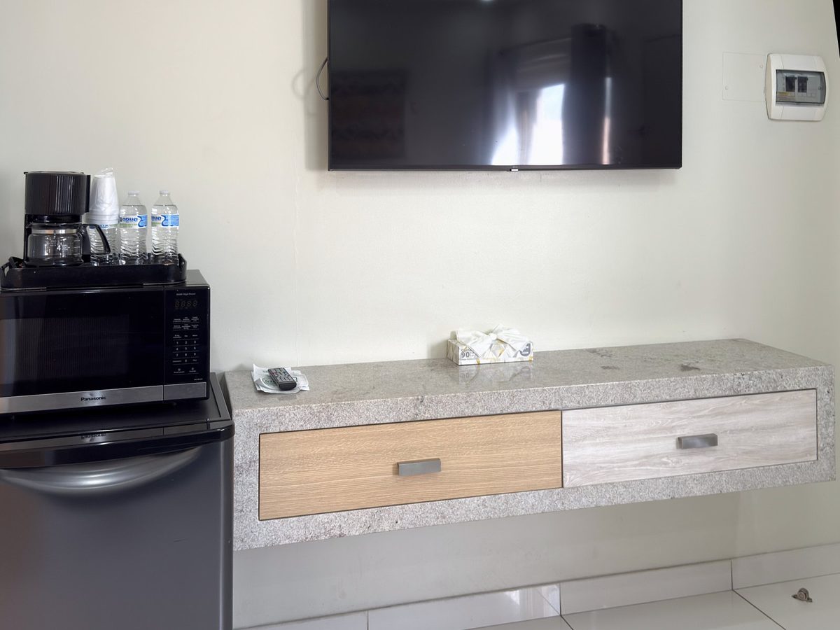 Junior Suite kitchenette: mini-fridge, microwave, coffee maker and TV
